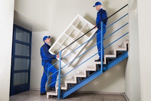 Local team removing furniture from an Islington flat