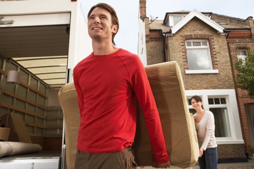 Careful loading of household items for a same day move in Islington