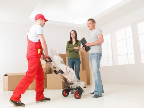 Packing and unloading boxes during a man and van service